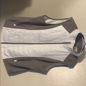 white and grey vest
